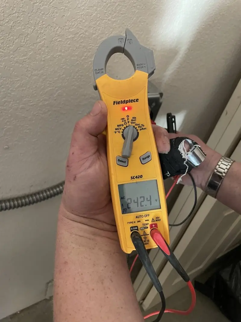 Voltage testing with clamp meter during Generator Installation in Fenton